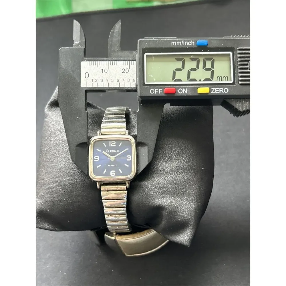 Carriage Navy Blue Dial Silver Tone Women’s Stretch Band Quartz Watch